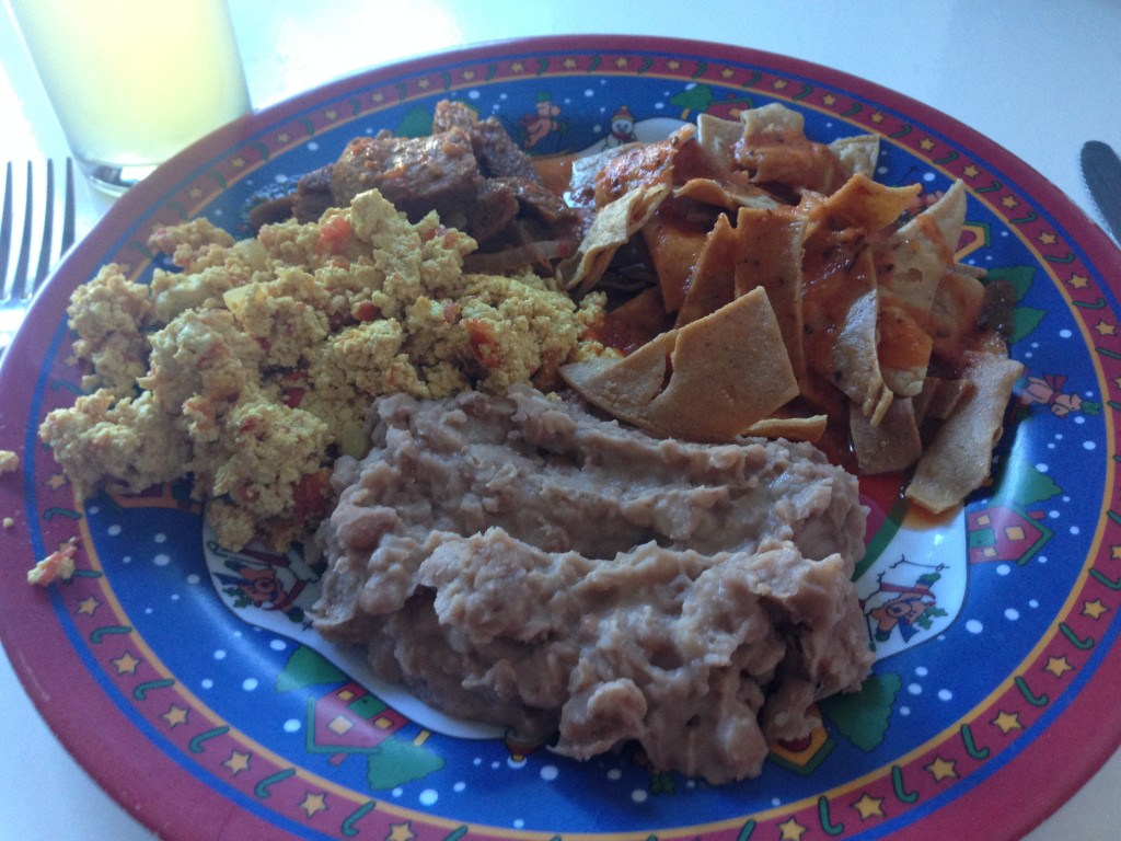 Breakfast at Mary's: A hearty tofu scramble, refried beans, chilaquiles with a red mole and seasons soy chunks.  We also had fruit, though I forgot to photograph it.. Sorry!